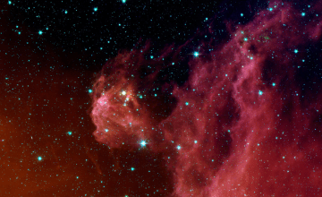 Image of a reddish-pinkish nebula set against stars in black space
